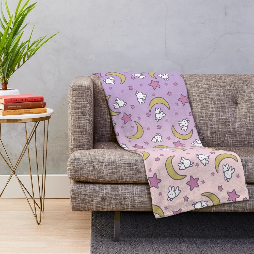 Soft and colorful plush blanket featuring a Sailor Moon-inspired Usagi moon bunny design