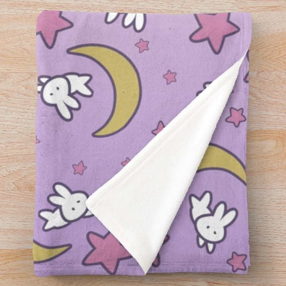 Soft and colorful plush blanket featuring a Sailor Moon-inspired Usagi moon bunny design