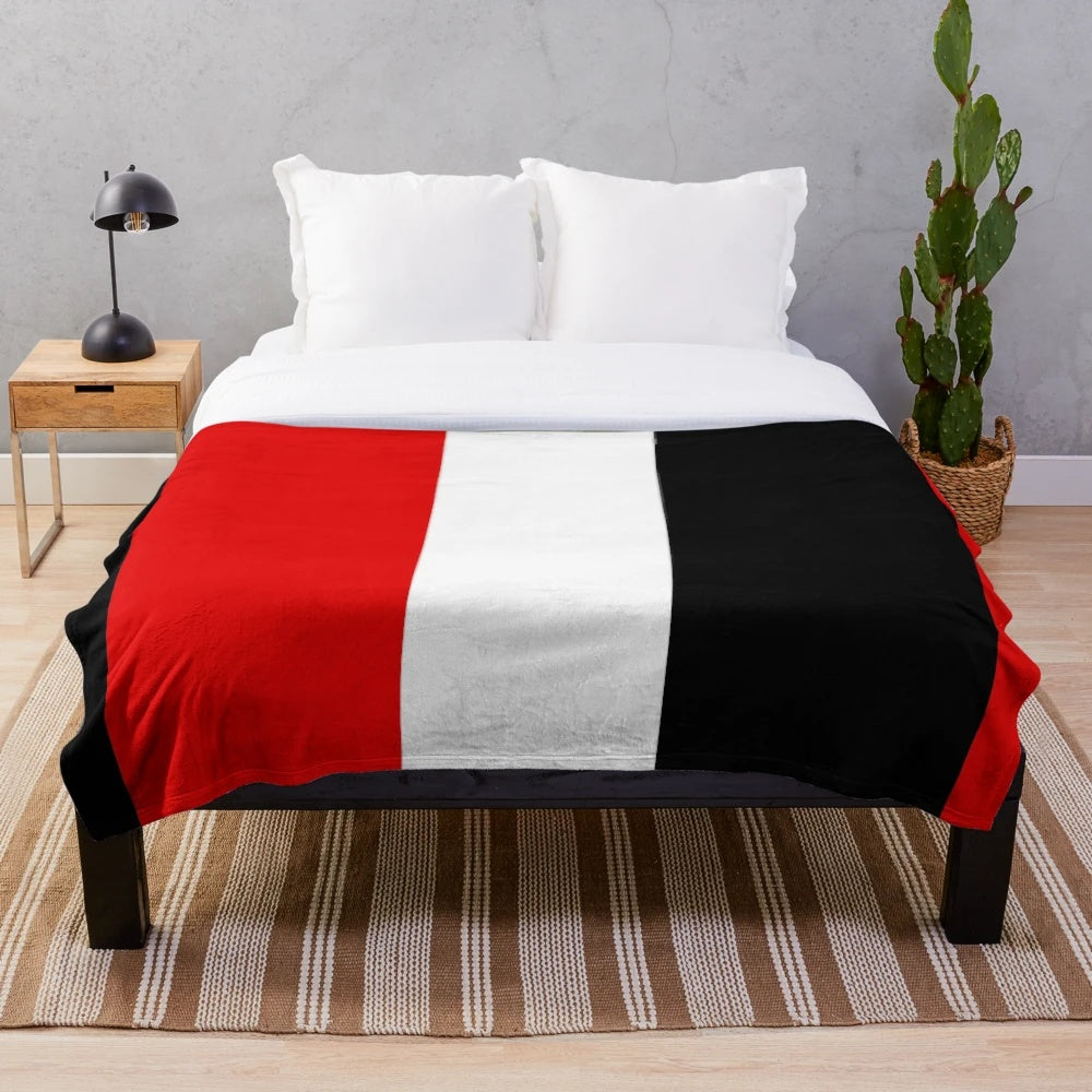 Saints plush blanket in red, black, and white team colors