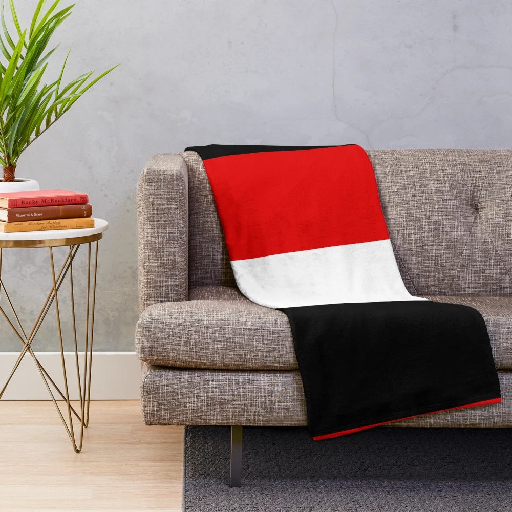 Saints plush blanket in red, black, and white team colors