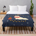 Soft and cuddly Samoyed dog on a plush blanket