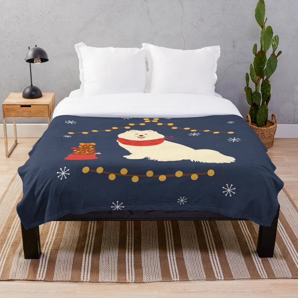 Soft and cuddly Samoyed dog on a plush blanket