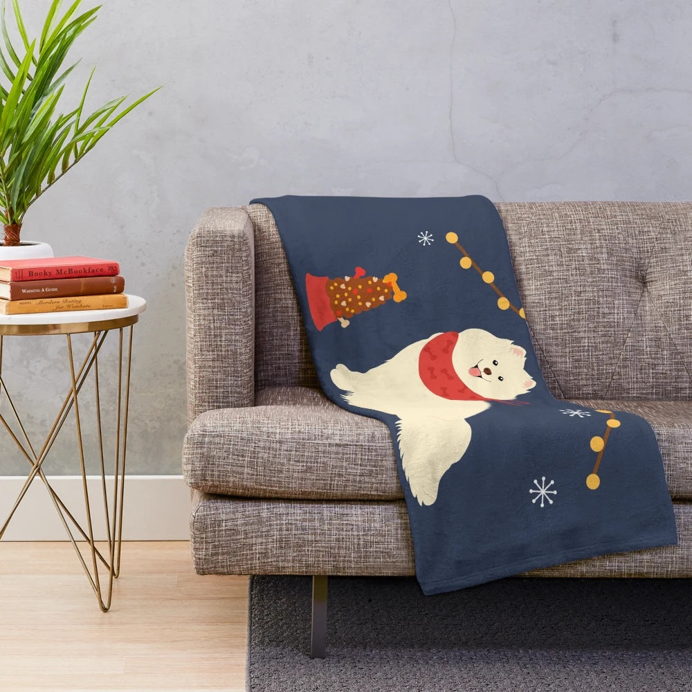 Soft and cuddly Samoyed dog on a plush blanket