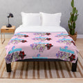 Soft and cuddly plush blanket featuring Sanna the unicorn character