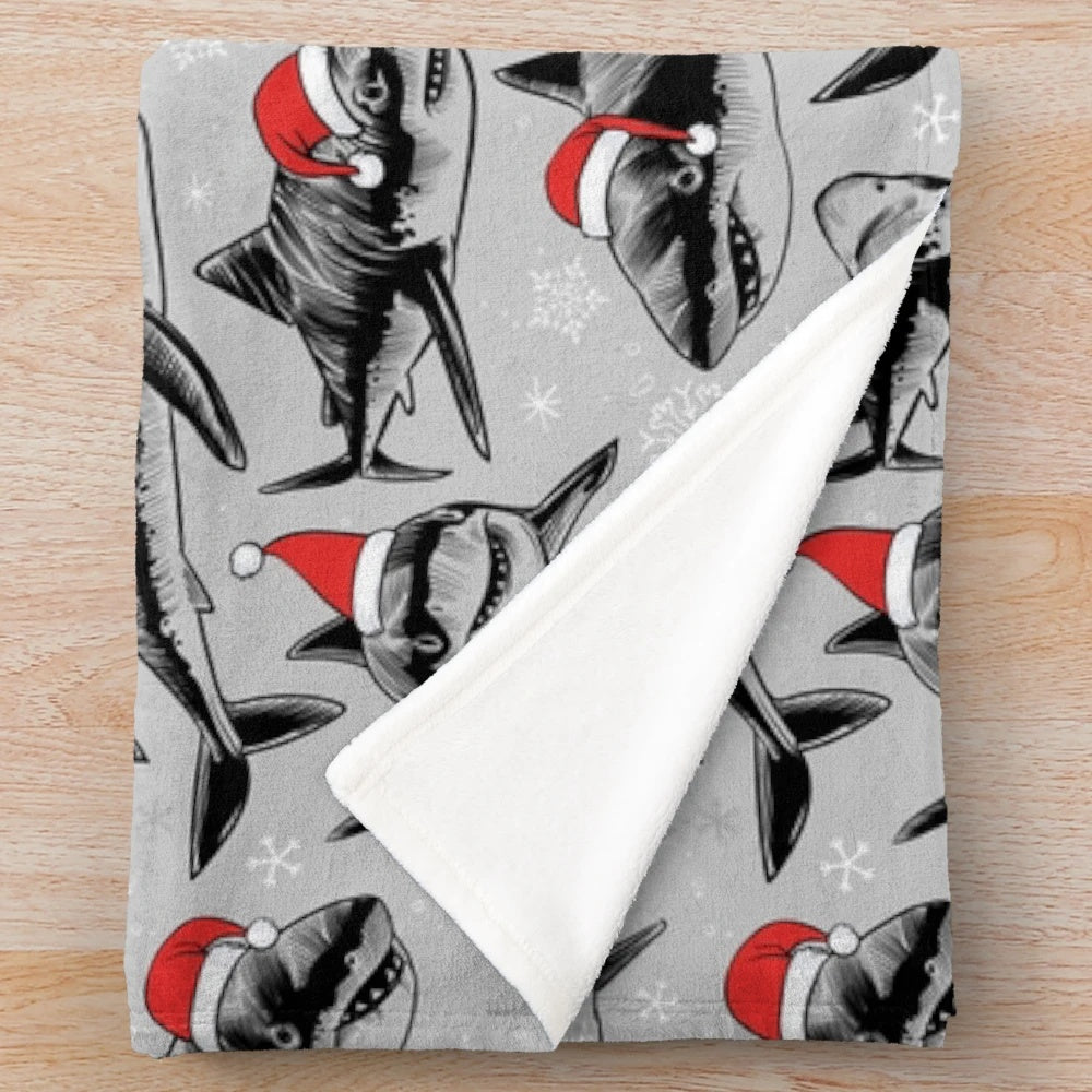 Santa Sharks Plush Blanket with a cheerful holiday shark pattern