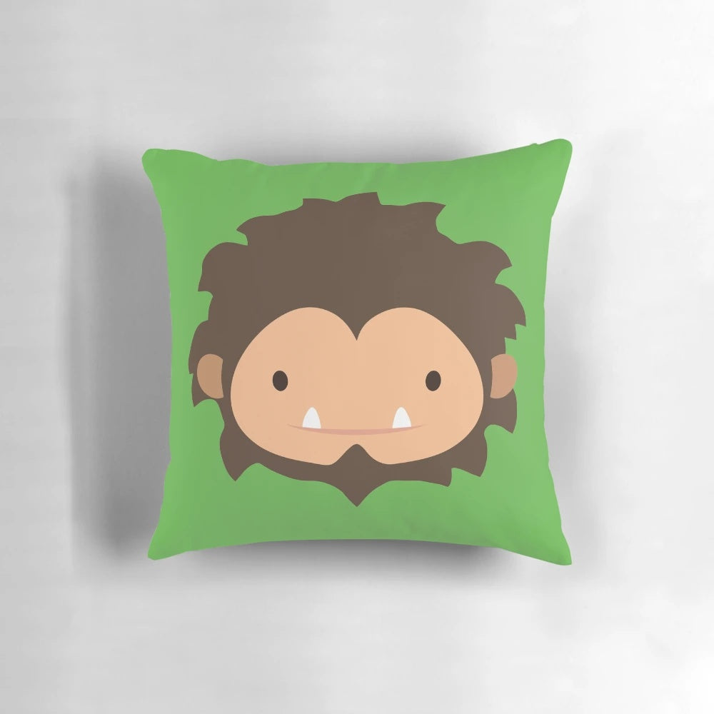 Plush sasquatch pillow with a large, friendly-looking face and details inspired by the cryptid creature