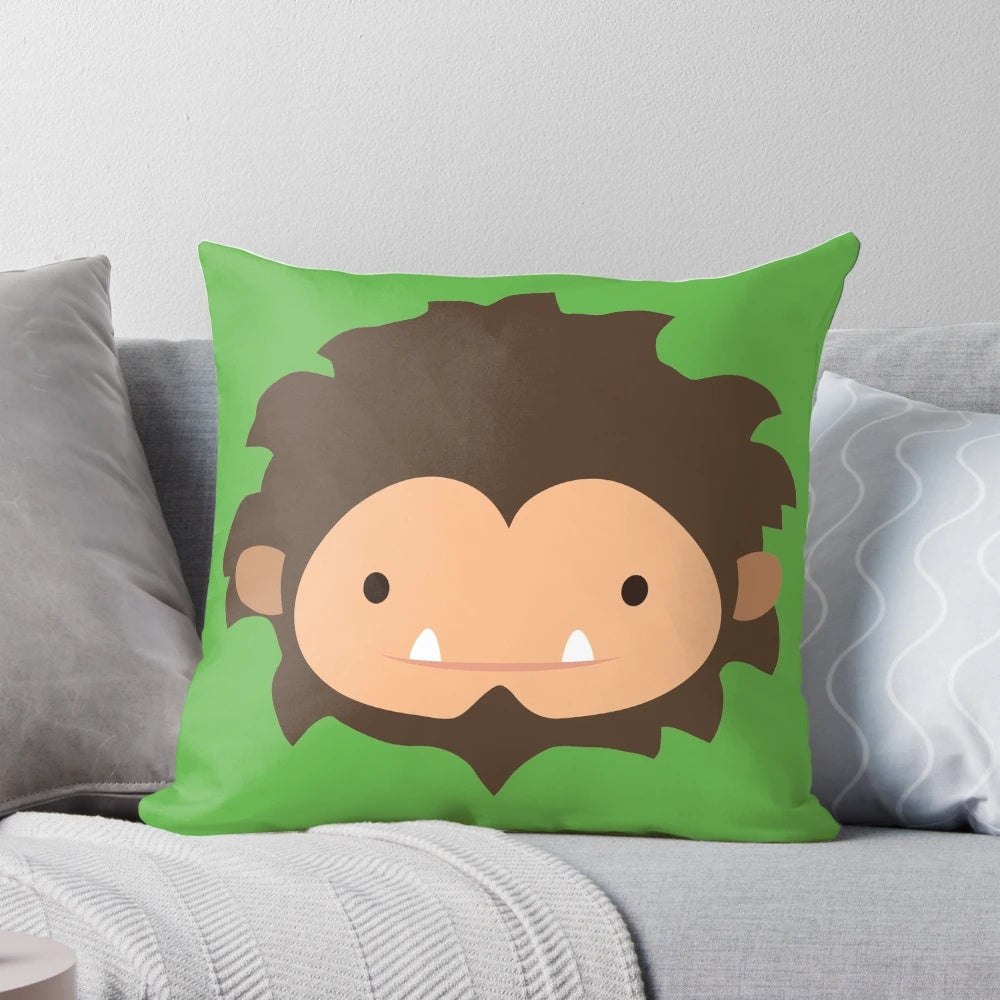 Plush sasquatch pillow with a large, friendly-looking face and details inspired by the cryptid creature