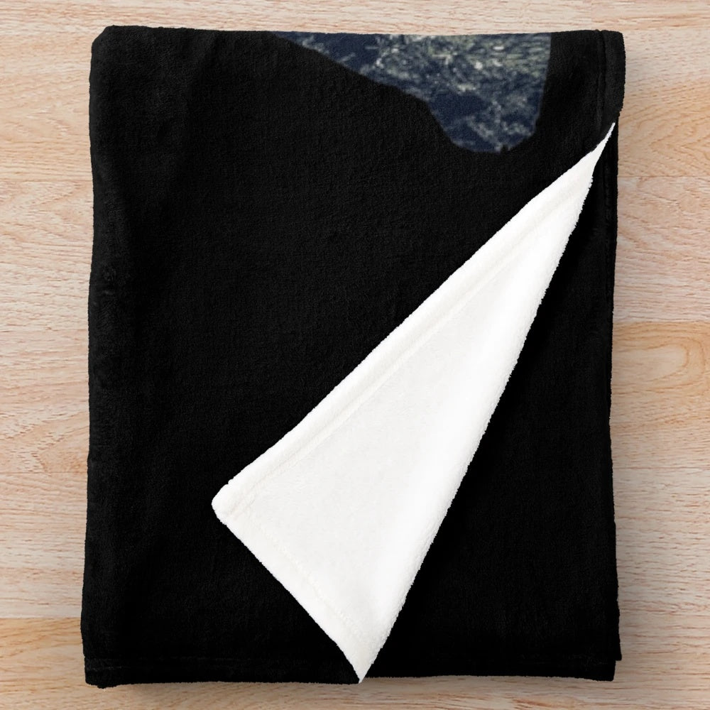 Sasquatch silhouette design on a cozy plush blanket