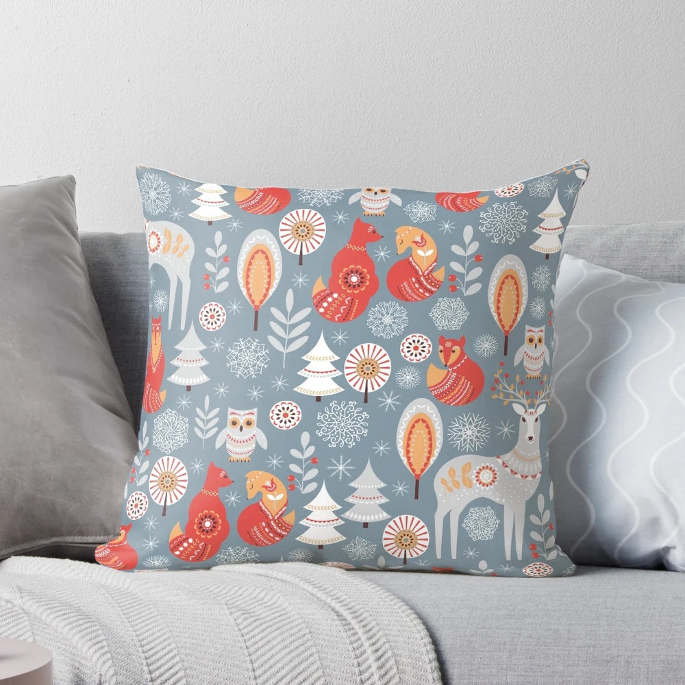 A decorative pillow featuring a seamless pattern with a winter forest scene, including deer, owl, and fox in a Scandinavian-inspired design.