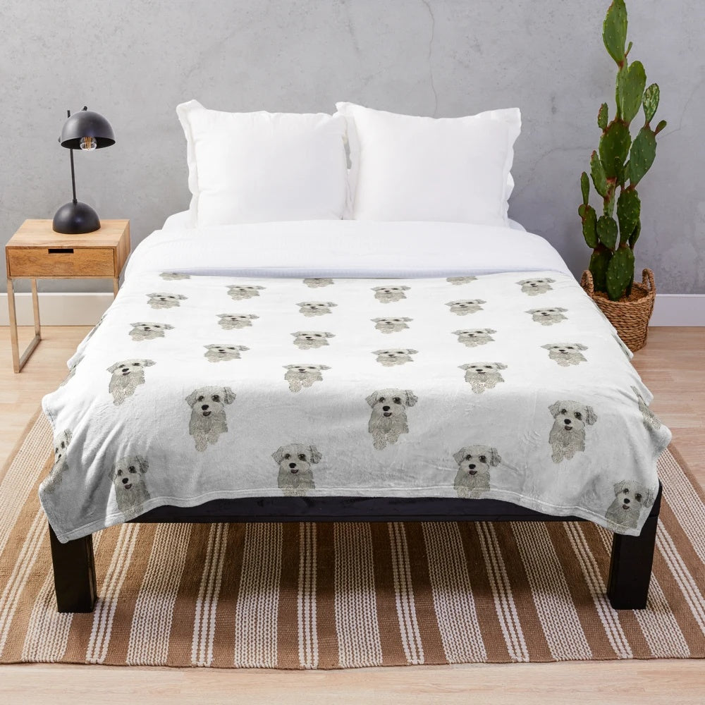 Schnoodle dog illustration on a plush blanket