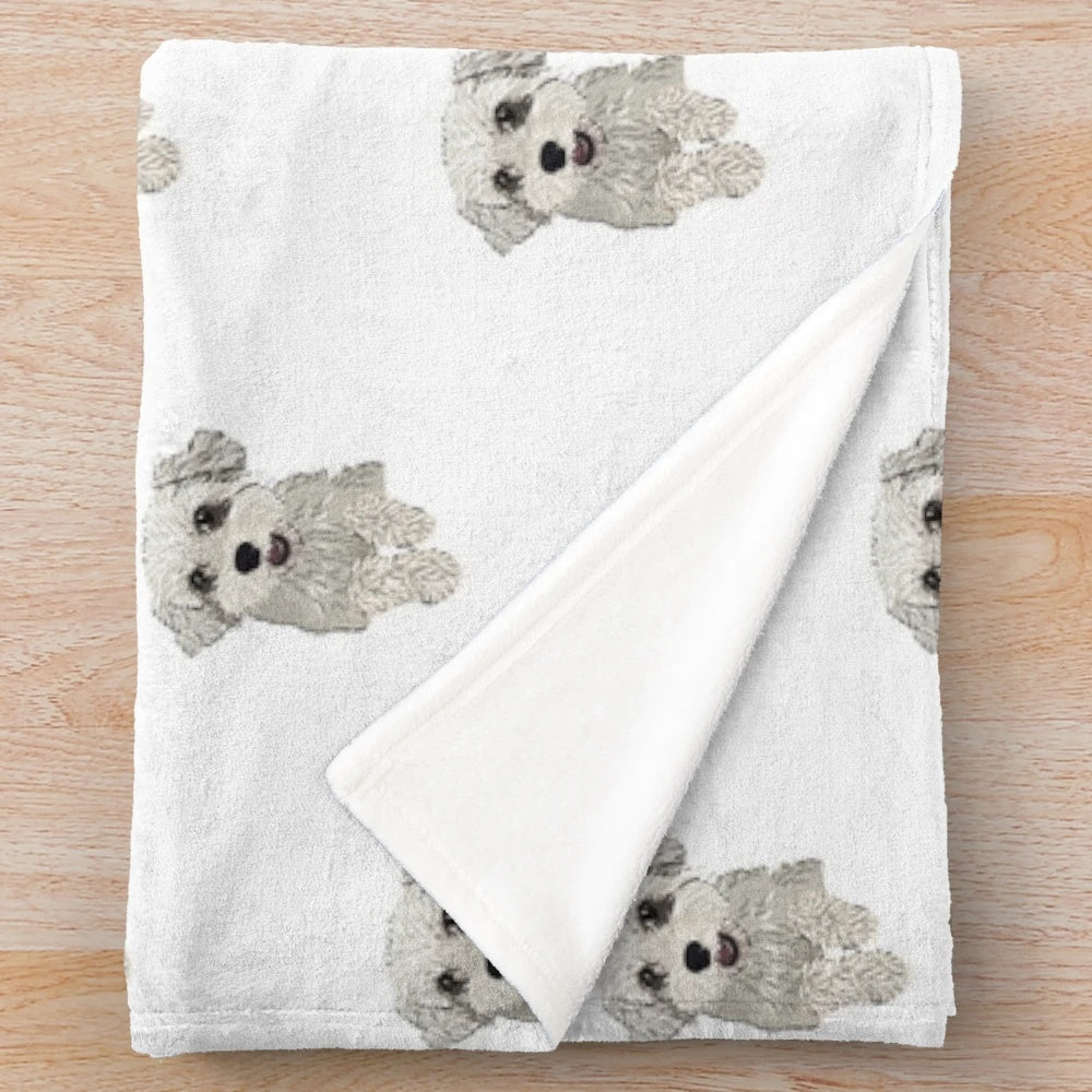 Schnoodle dog illustration on a plush blanket