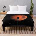 Plush blanket featuring the silhouette of the Rocinante ship from the sci-fi series The Expanse