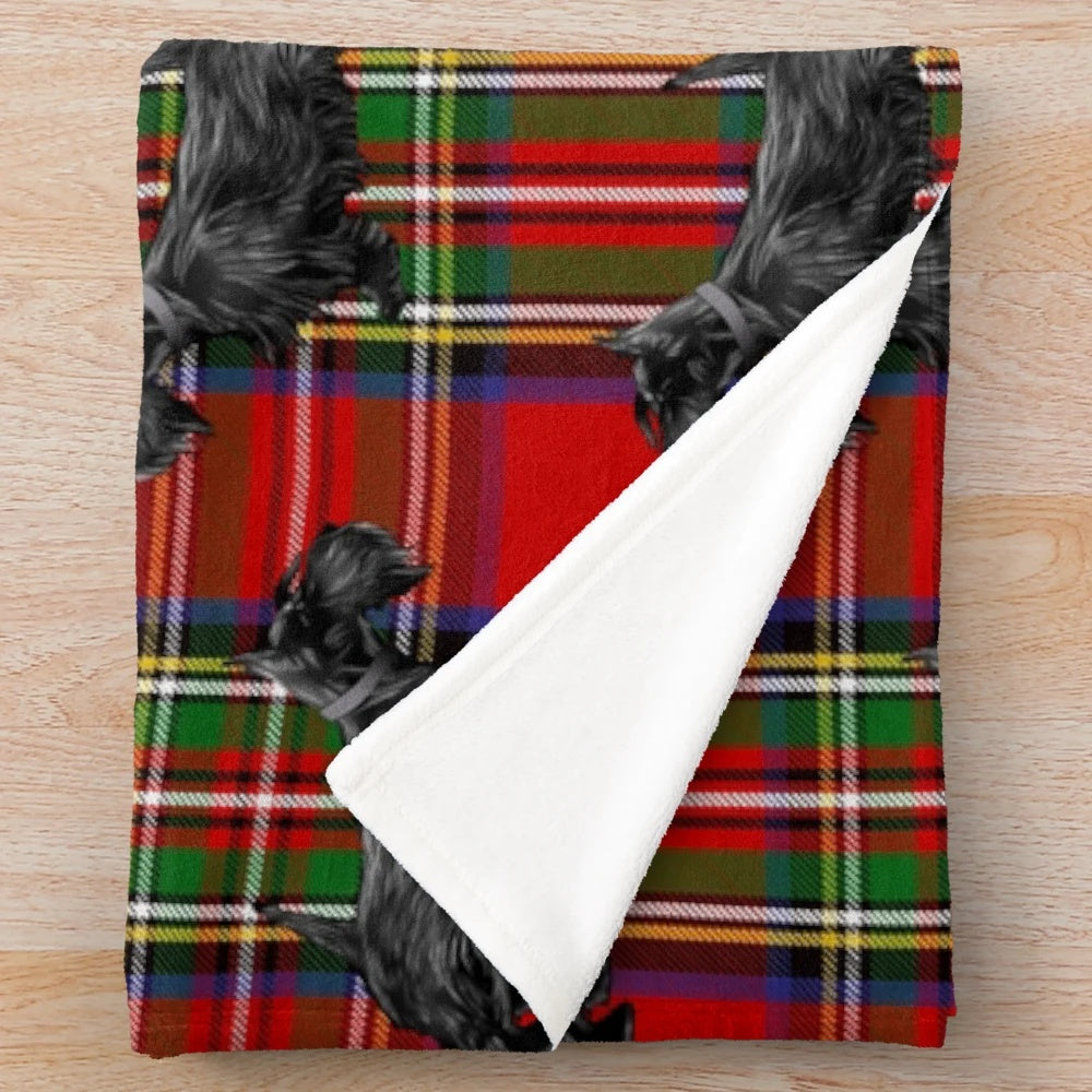 Soft and snuggly plush blanket featuring a scottie dog on a red Scottish tartan pattern