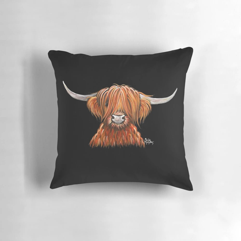 A cozy, soft pillow featuring a Scottish Highland cow with shaggy hair, perfect for children.