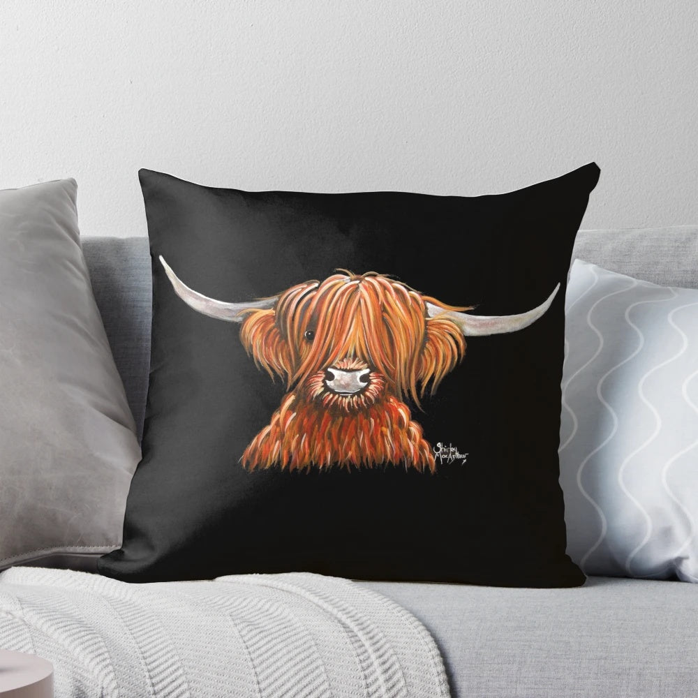 A cozy, soft pillow featuring a Scottish Highland cow with shaggy hair, perfect for children.