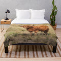 Soft and plush Scottish Highland cow blanket for home decor