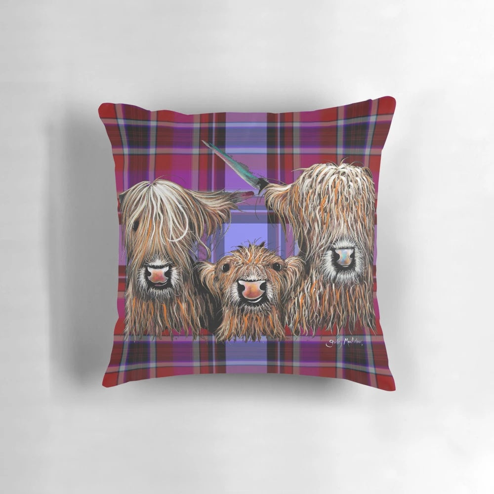 A soft, plush pillow featuring a friendly, nosey Scottish Highland cow in a vibrant tartan pattern.
