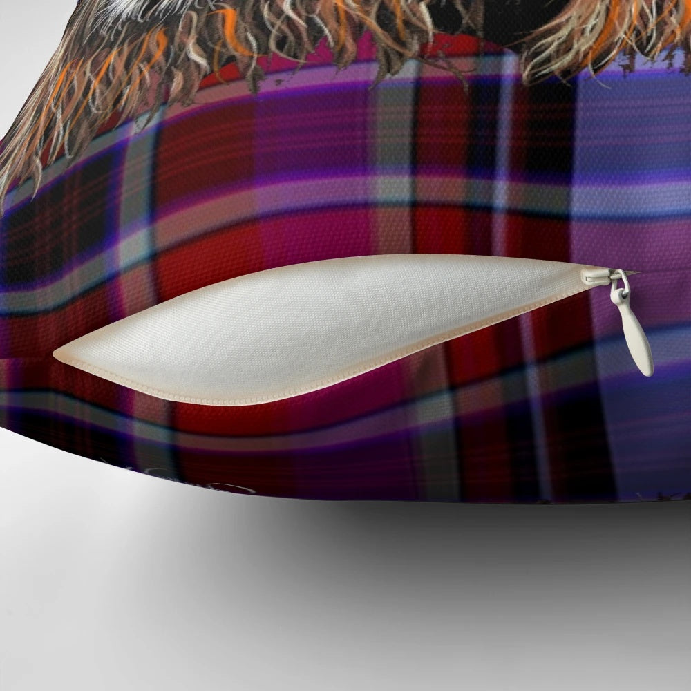 A soft, plush pillow featuring a friendly, nosey Scottish Highland cow in a vibrant tartan pattern.