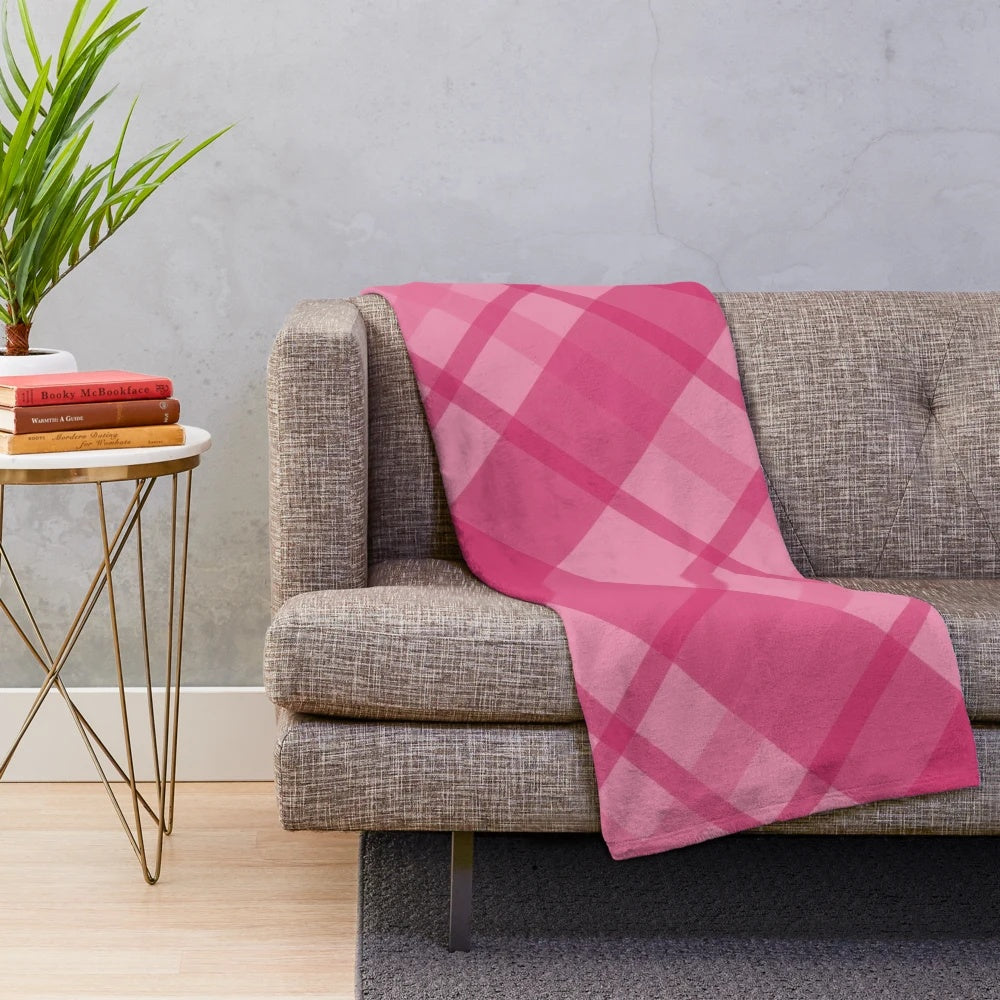 Scottish tartan plush blanket in pink and red tones