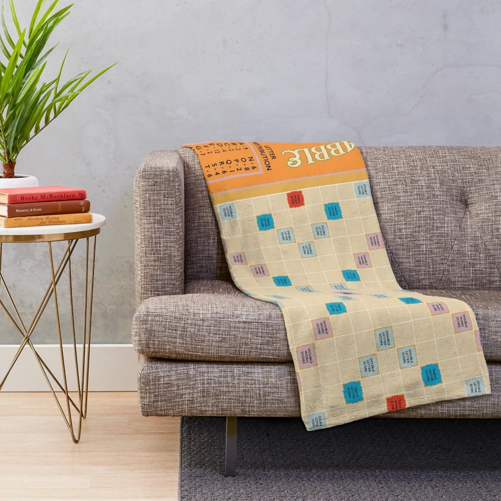 Scrabble-themed plush blanket with game tiles