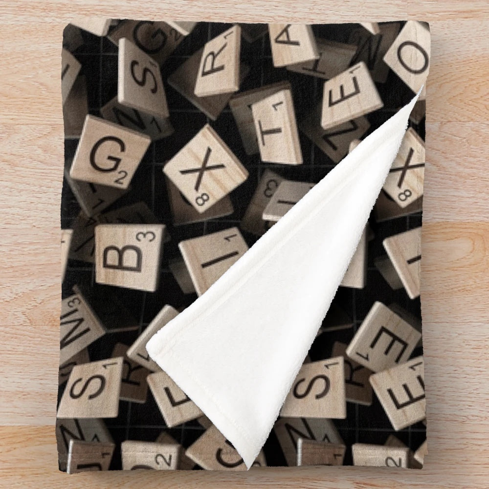Scrabble tile pattern plush blanket with alphabet letters