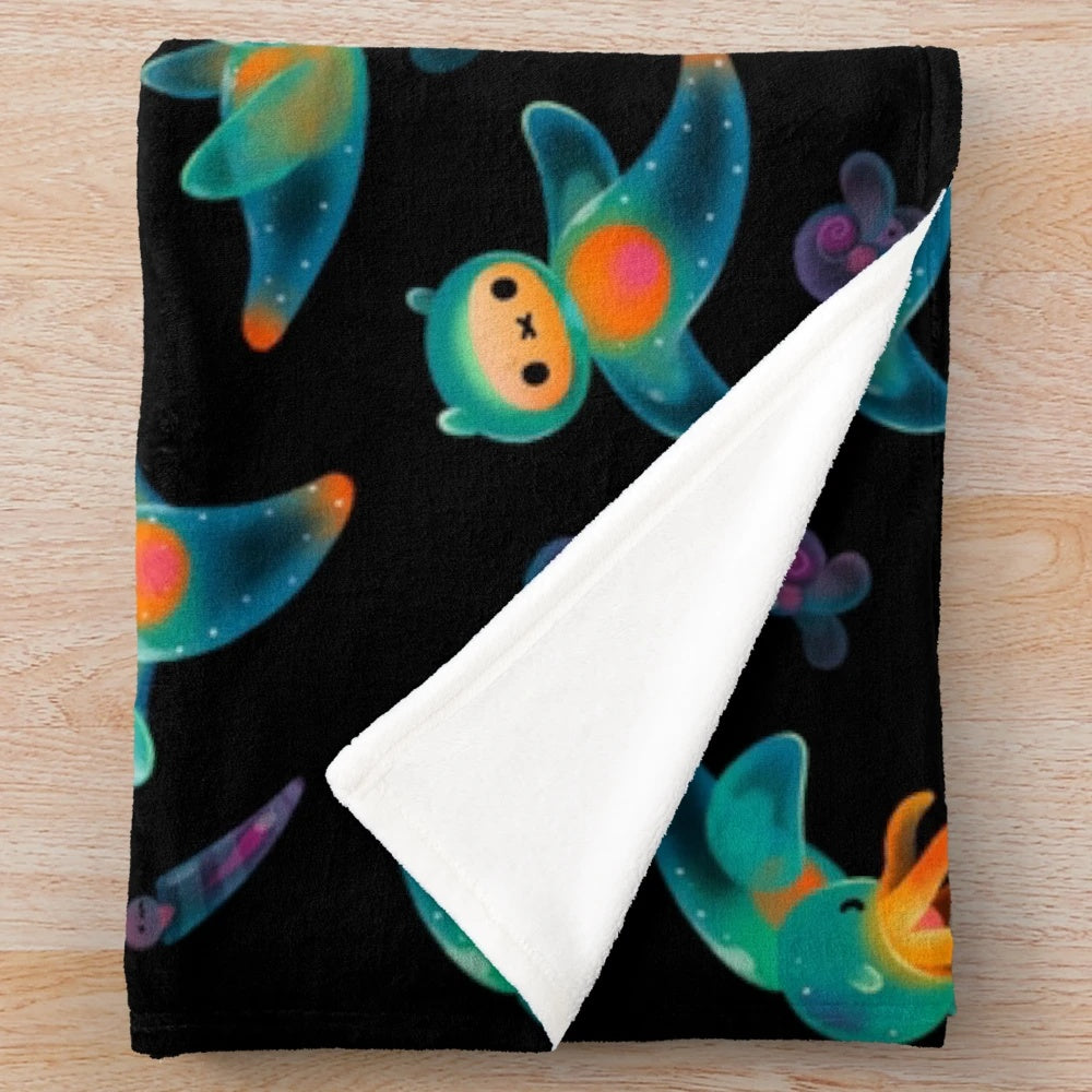 A soft and snuggly plush blanket featuring the delicate sea angel and sea butterfly creatures