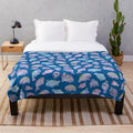 Soft, cuddly plush blanket featuring a sea cow (sirenians) design