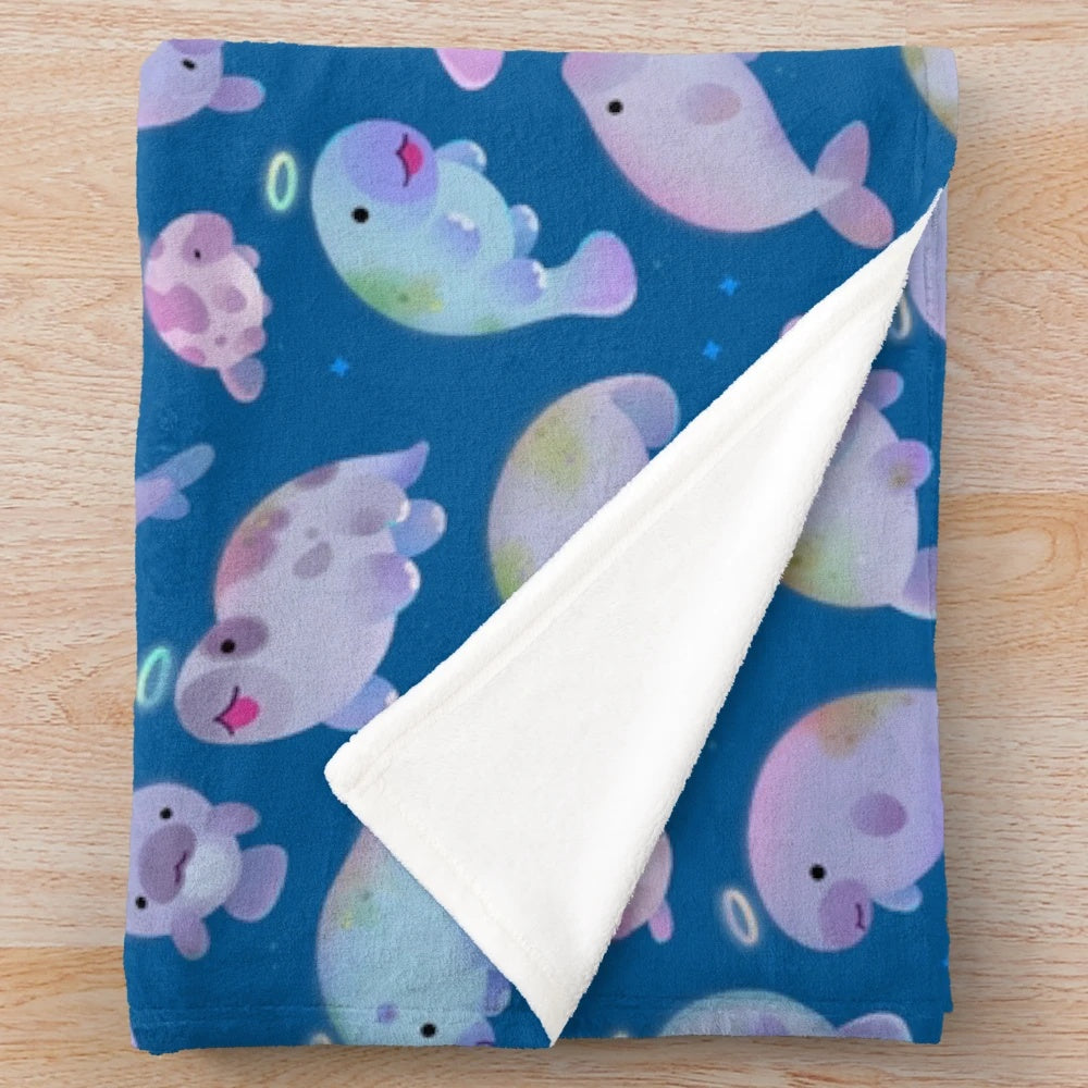 Soft, cuddly plush blanket featuring a sea cow (sirenians) design