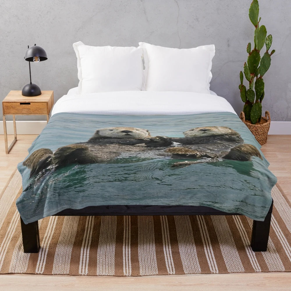 Soft and cuddly sea otter plush blanket