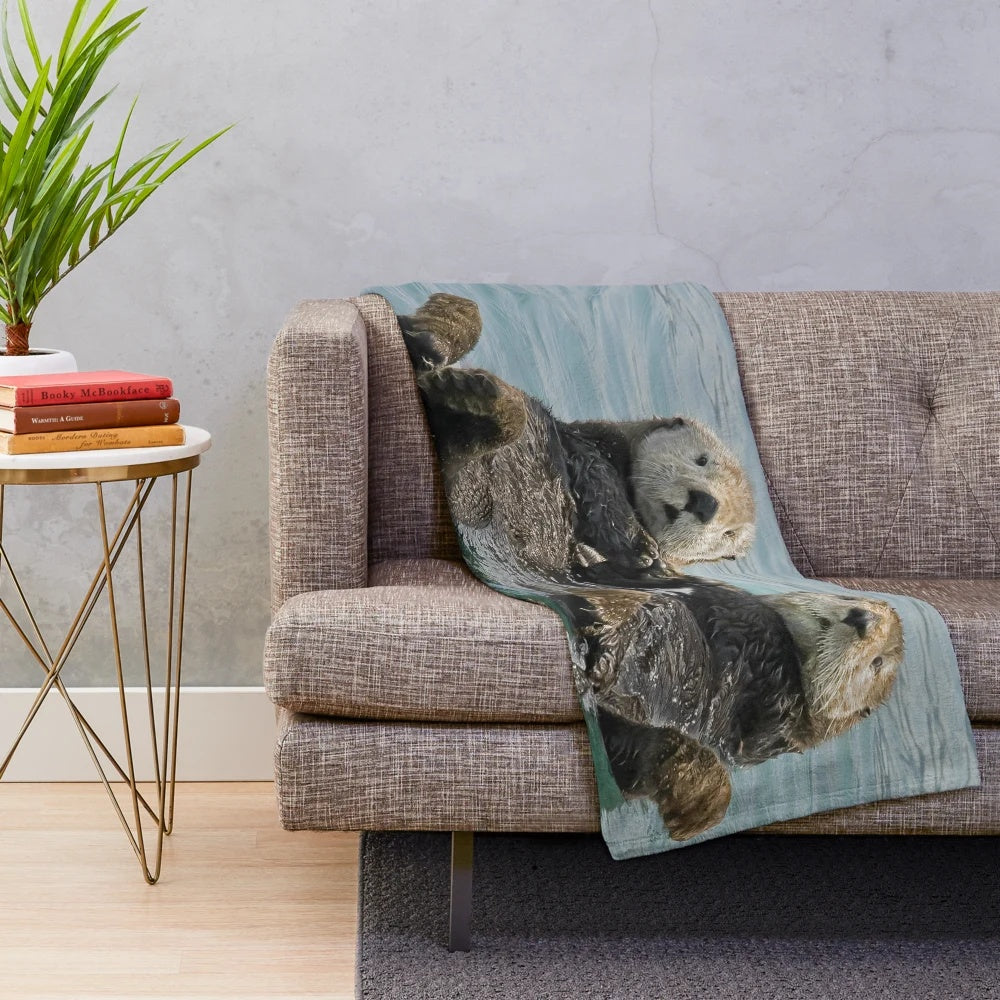 Soft and cuddly sea otter plush blanket