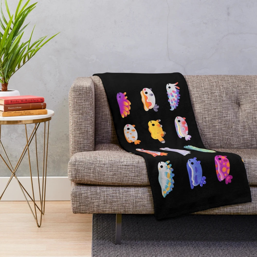 Soft and cuddly plush blanket featuring a vibrant sea slug design