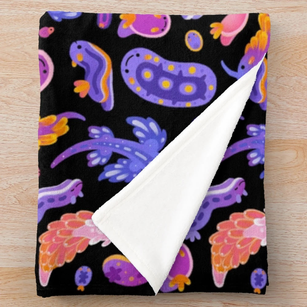 Soft and cuddly sea slug plush blanket for marine life enthusiasts