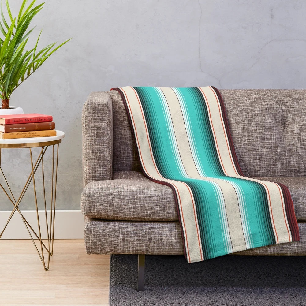 Navajo-inspired striped plush blanket in fall colors