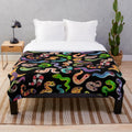 Soft plush blanket with a serpent or snake design, ideal for animal lovers