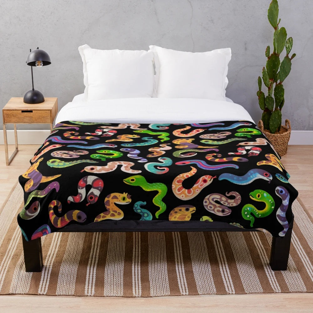 Soft plush blanket with a serpent or snake design, ideal for animal lovers