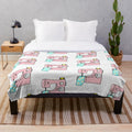 Sewing machine plush blanket with embroidered design