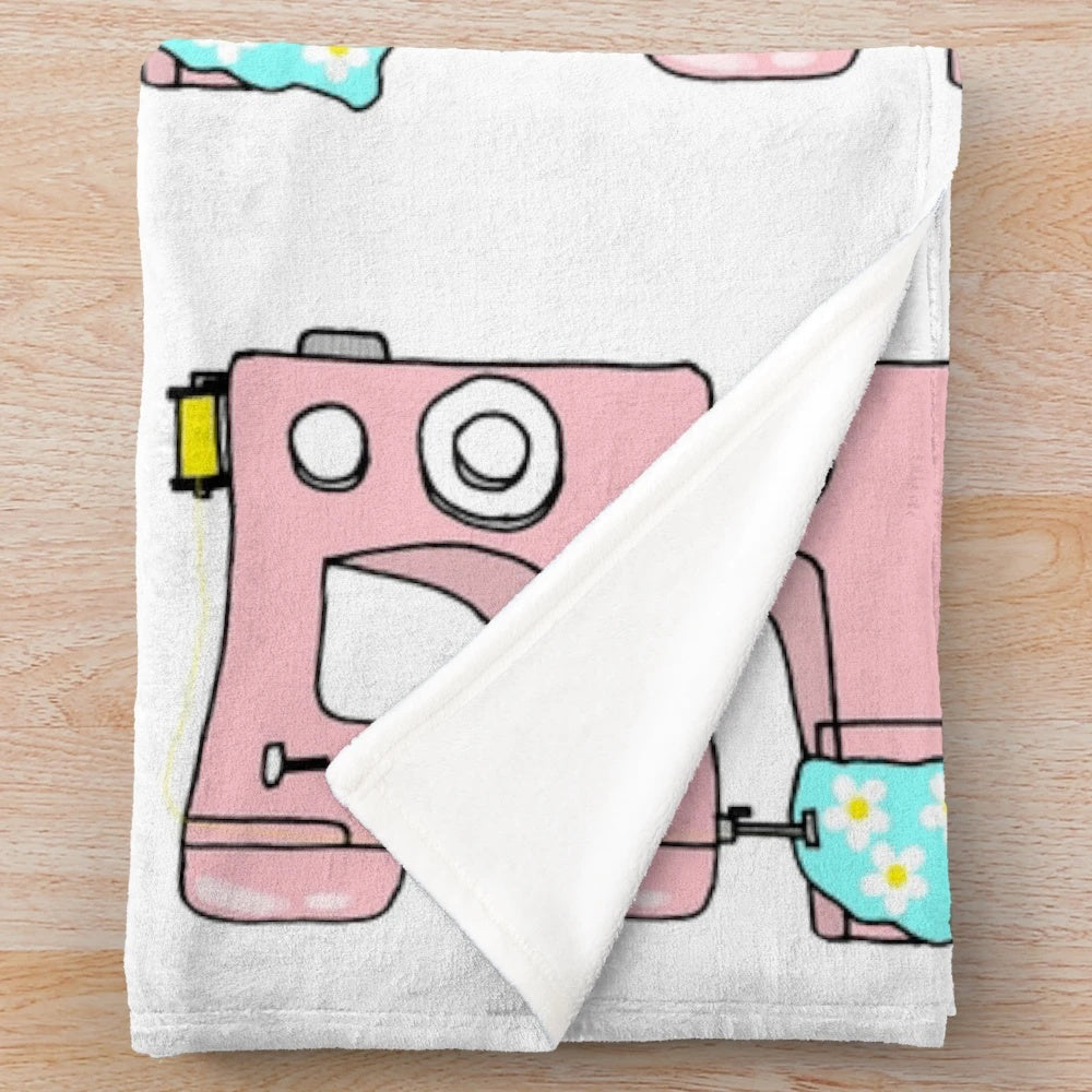 Sewing machine plush blanket with embroidered design