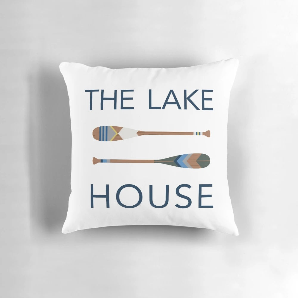 Shabby chic lake-themed pillow with oar and paddle design