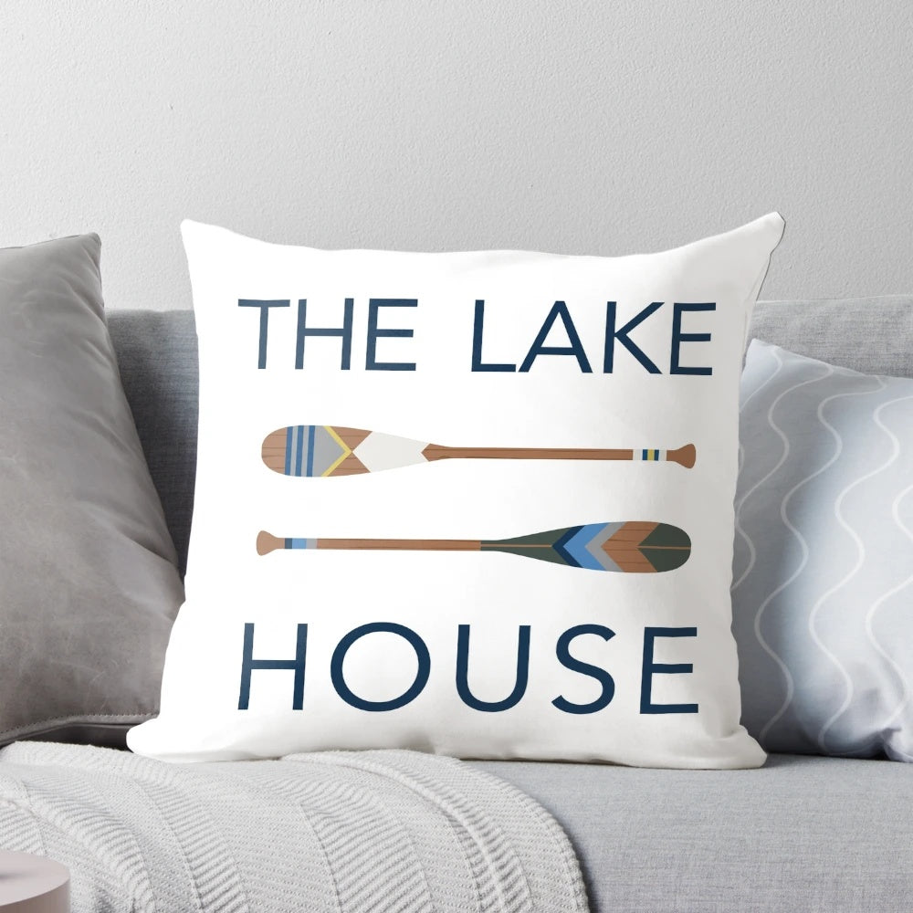 Shabby chic lake-themed pillow with oar and paddle design