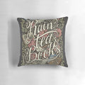 A cozy, shabby chic pillow featuring a design of rain, tea, and books.
