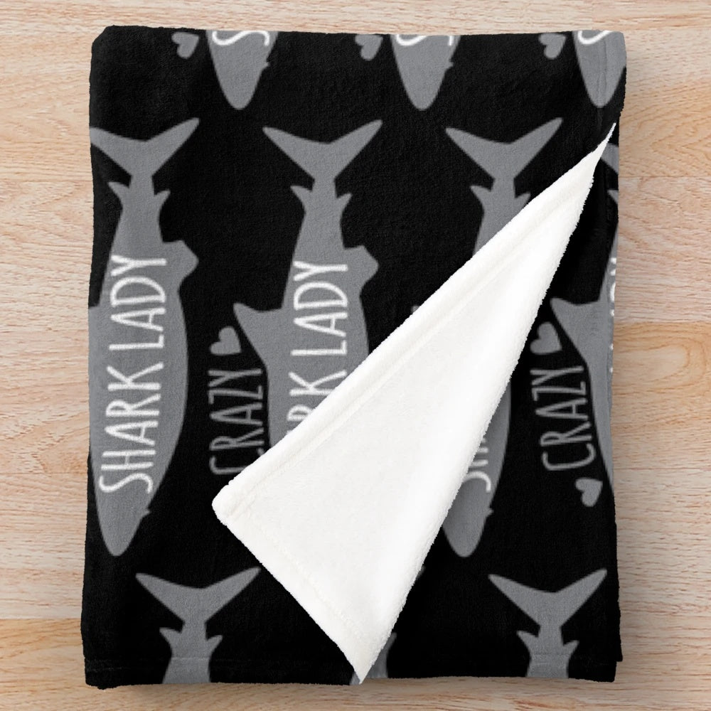 Soft and cuddly shark-themed plush blanket for home decor