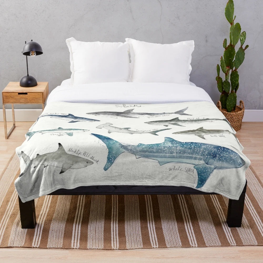 Sharks plush blanket with a landscape design featuring various shark species