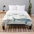 Sharks plush blanket with a landscape design featuring various shark species