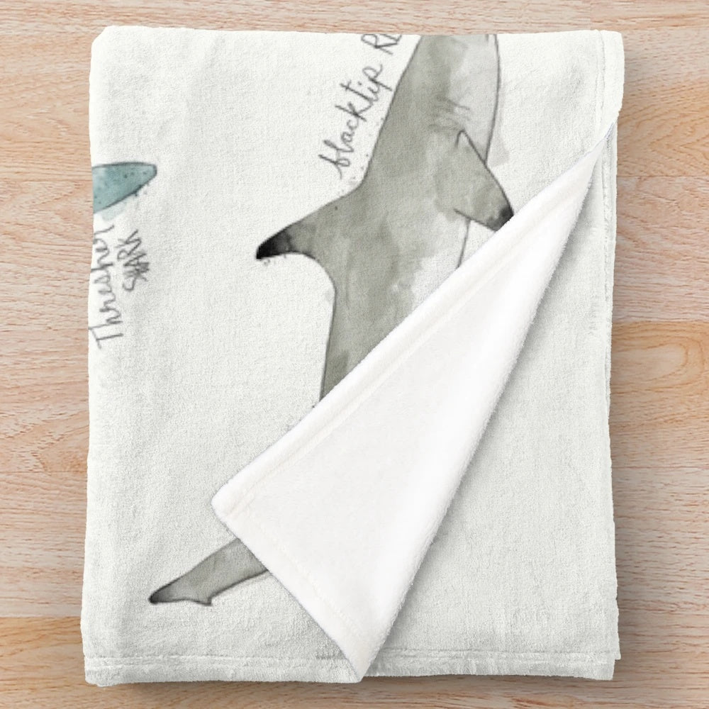 Sharks plush blanket with a landscape design featuring various shark species