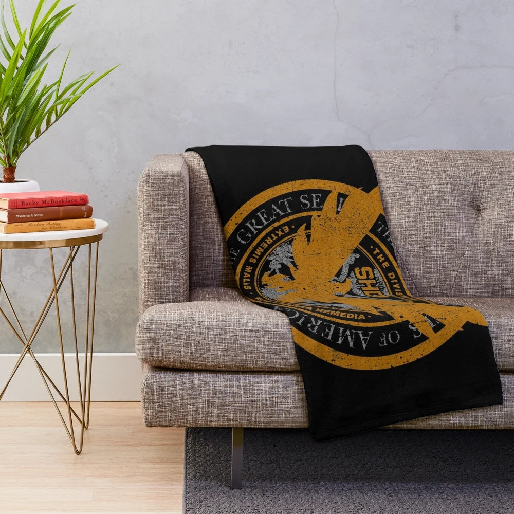 SHD Seal plush blanket featuring a Phoenix bird design