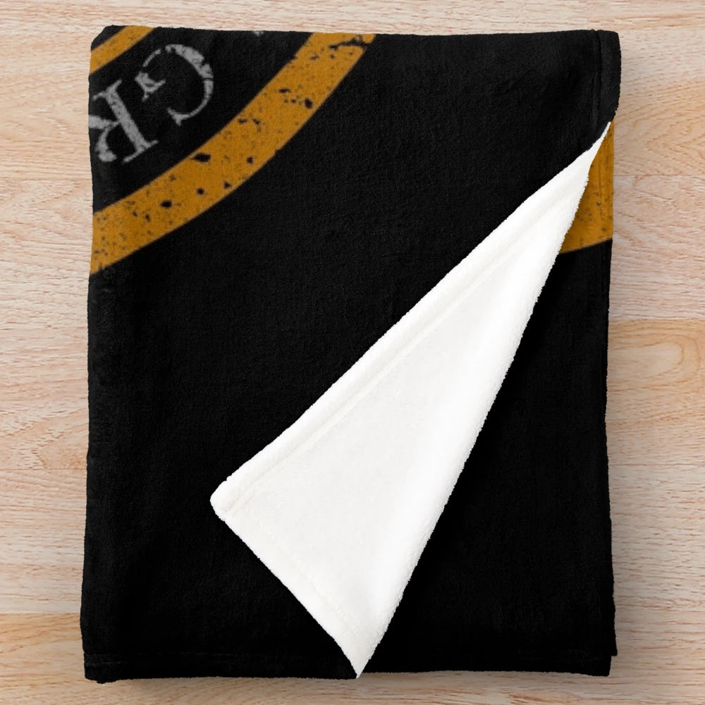 SHD Seal plush blanket featuring a Phoenix bird design
