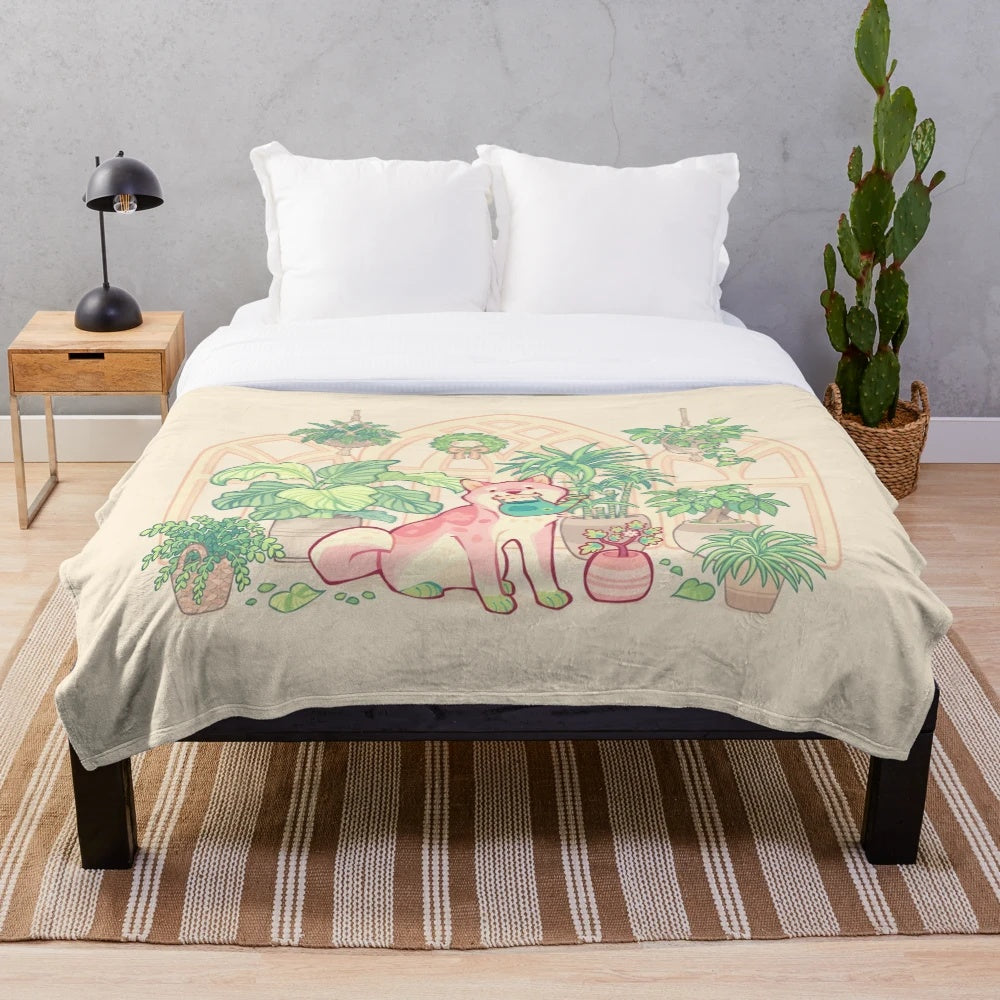 A soft, plush blanket featuring a green and pink shibakura plant design and a shiba dog