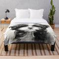 Shih Tzu dog breed image on a plush, cozy blanket