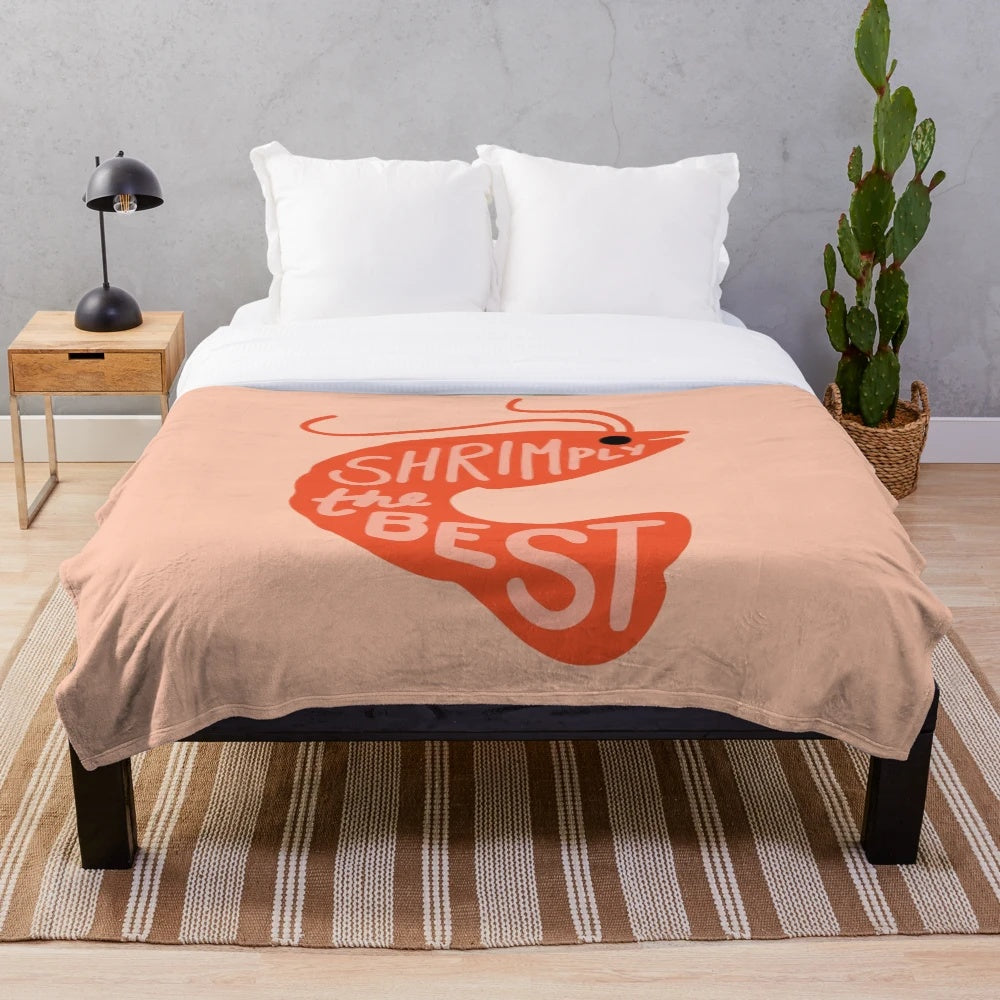 Shrimply the Best plush blanket featuring a cute cartoon shrimp character