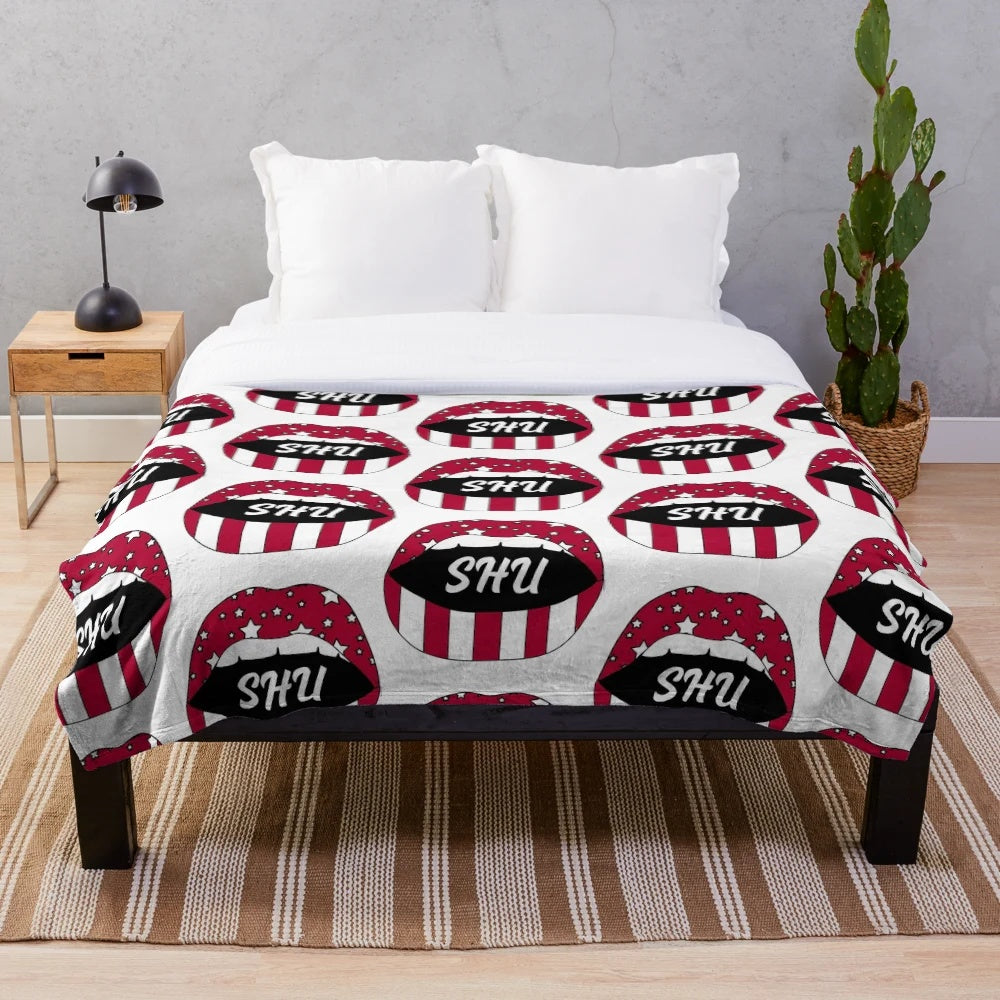 SHU Lips! Plush Blanket featuring the Sacred Heart University Pioneers logo